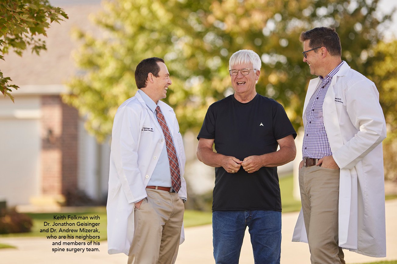 Keith Folkman with  Dr. Jonathon Geisinger and Dr. Andrew Mizerak, who are his neighbors and members of his spine surgery team.