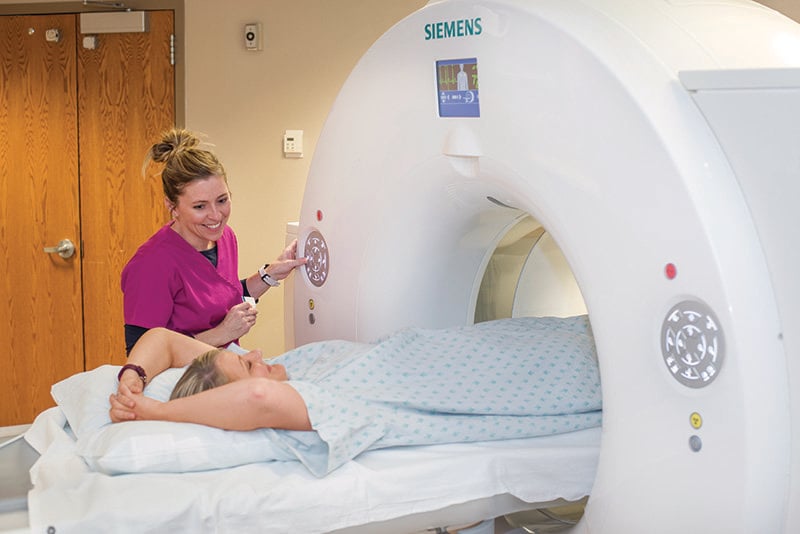 Amanda Akers, RT, (R), (CT), (MR), conducts a cardiac CTA on a patient at Mary Greeley.