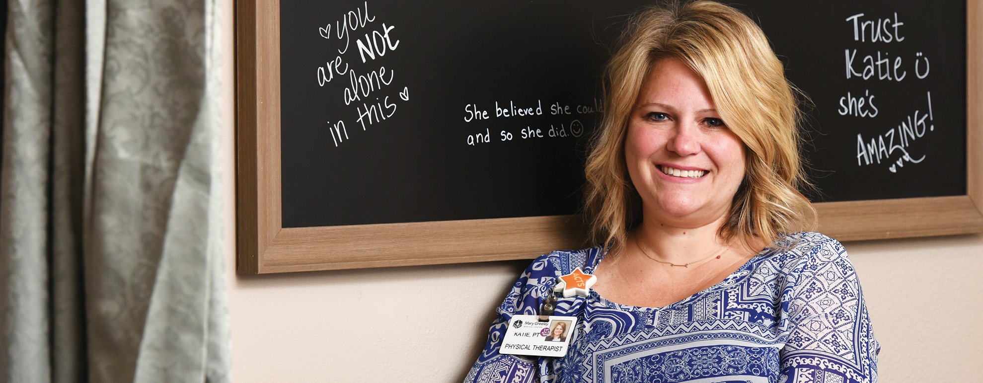 Mary Greeley therapist Katie Albrecht, MPT, PT, specializes in issues related to women’s pelvic health, including problems with incontinence and sexual pain. She’s shown here in front of an inspiring chalk board in Mary Greeley’s new Women’s Treatment Room.