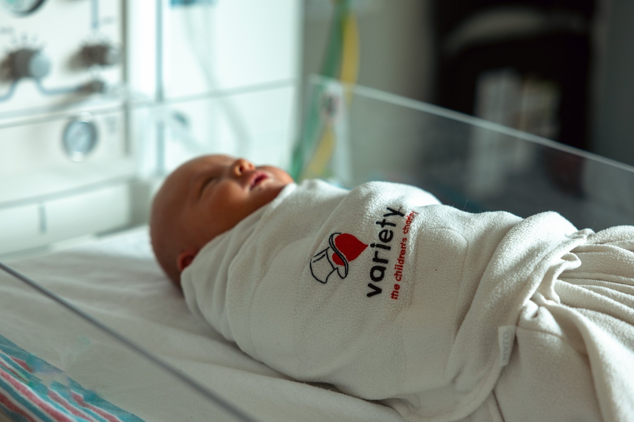 Newborn baby at Mary Greeley shown in a Variety - The Children's Charity of Iowa Sleep Sack